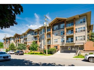 Photo 1: 209 20219 54A Avenue in Langley: Langley City Condo for sale in "Suede" : MLS®# R2653341