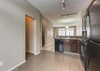 Photo 11: 1406 125 Panatella Way NW in Calgary: Panorama Hills Row/Townhouse for sale : MLS®# A2021769