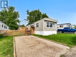 Photo 1: 180, 4000 13th Avenue SE in Medicine Hat: House for sale : MLS®# A2052175