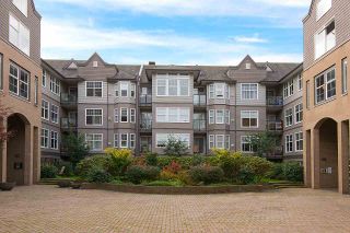 Photo 19: 404 20200 56 Avenue in Langley: Langley City Condo for sale in "The Bentley" : MLS®# R2116212