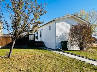 Photo 1: 4432 59 Street: Rocky Mountain House Detached for sale : MLS®# A2032070