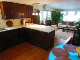 Photo 2: 23 4200 DEWDNEY TRUNK Road in Coquitlam: Ranch Park Manufactured Home for sale in "HIDEWAY PARK" : MLS®# V984553