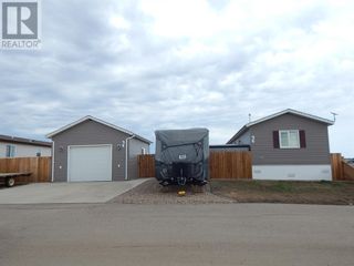 Photo 1: 61 Deerglen Mobile Home Park in High Level: Condo for sale : MLS®# A2039904