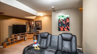 Photo 27: 108 Stonemere Place: Chestermere Row/Townhouse for sale : MLS®# A1259349