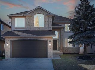 Photo 1: 25 Strathridge Way SW in Calgary: Strathcona Park Detached for sale : MLS®# A2089857