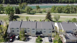 Photo 2: 350 Point Mckay Gardens NW in Calgary: Point McKay Row/Townhouse for sale : MLS®# A1233187