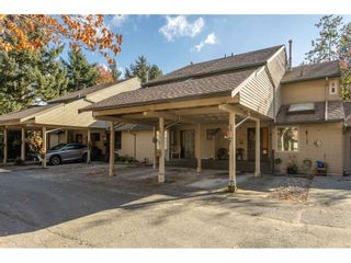 Photo 1: 1805 LILAC Drive in Surrey: King George Corridor Townhouse for sale in "ALDERWOOD" (South Surrey White Rock)  : MLS®# R2511865