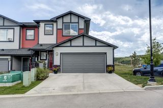 Photo 2: 808 Jumping Pound Common: Cochrane Row/Townhouse for sale : MLS®# A2053578