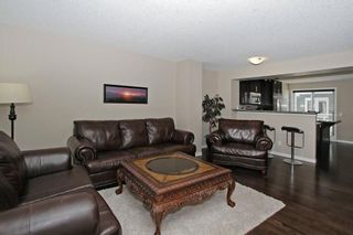 Photo 8: 105 AUBURN BAY Square SE in Calgary: Auburn Bay House for sale : MLS®# C4141384