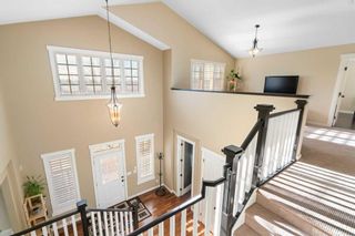 Photo 5: 7816 9 Avenue SW in Calgary: West Springs Detached for sale : MLS®# A2130106