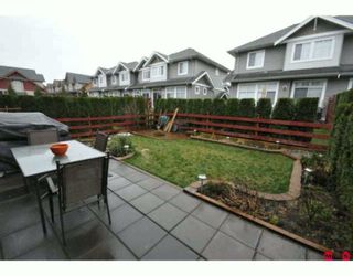 Photo 10: 35 16760 61ST Avenue in Surrey: Cloverdale BC Townhouse for sale in "Harvest Landing" (Cloverdale)  : MLS®# F2927875