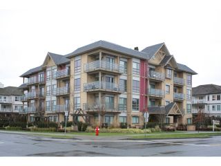 Photo 1: 108 5811 177B Street in Surrey: Cloverdale BC Condo for sale in "LATIS" (Cloverdale)  : MLS®# R2023487
