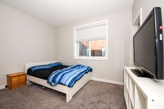 Photo 24: 404 Redstone Crescent NE in Calgary: Redstone Row/Townhouse for sale : MLS®# A1178308