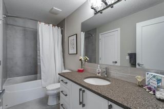 Photo 19: 208 8530 8A Avenue SW in Calgary: West Springs Apartment for sale : MLS®# A1110746