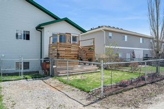 Photo 36: 548 Stonegate Way NW: Airdrie Semi Detached (Half Duplex) for sale : MLS®# A2129674
