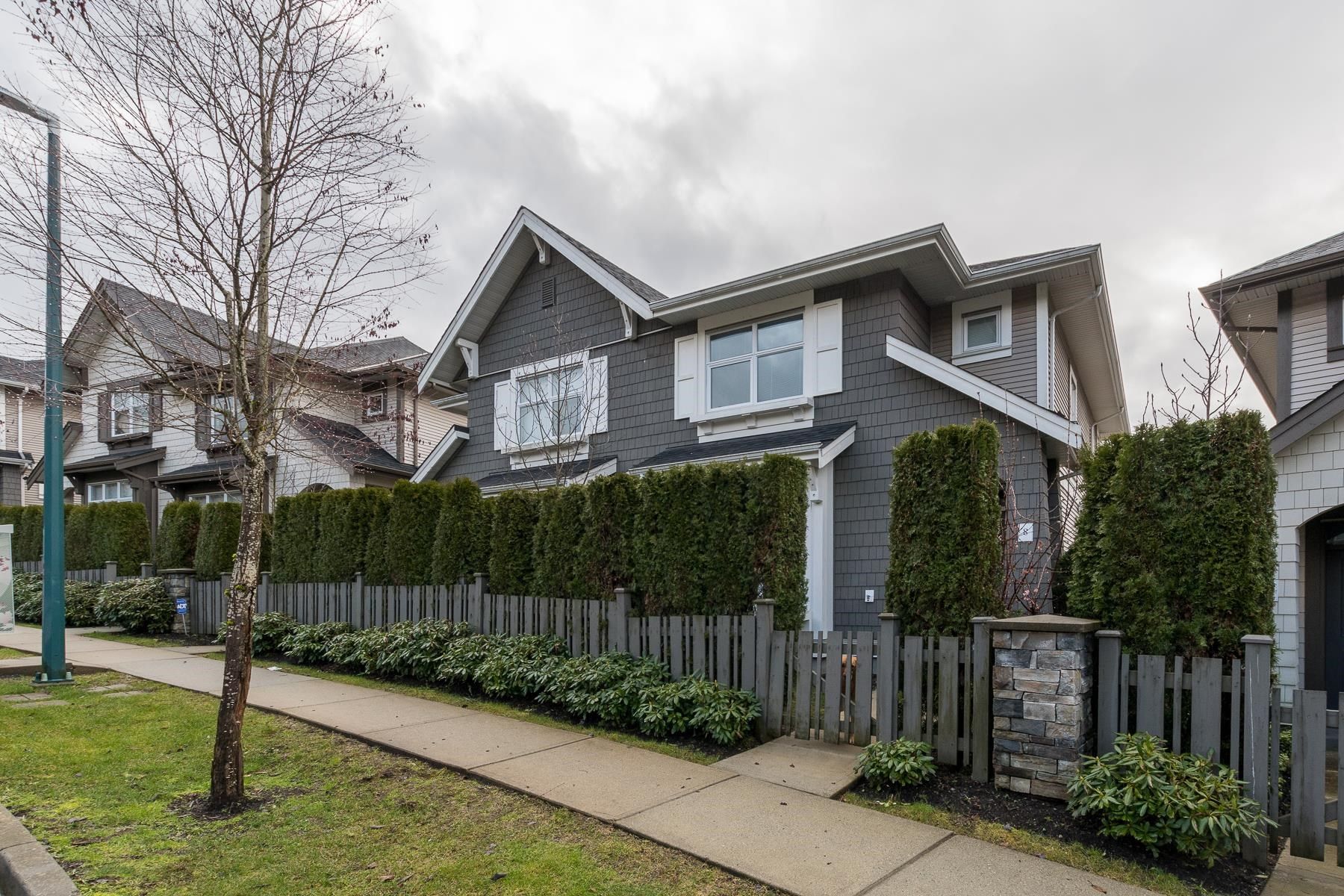 Main Photo: 8 3400 DEVONSHIRE Avenue in Coquitlam: Burke Mountain Townhouse for sale : MLS®# R2659442