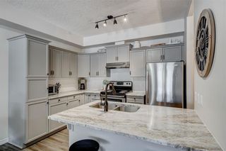 Photo 6: 104 15212 Bannister Road SE in Calgary: Midnapore Apartment for sale : MLS®# A1221795