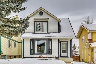 Photo 1: 207 STRATHEARN Crescent SW in Calgary: Strathcona Park House for sale : MLS®# C4165815
