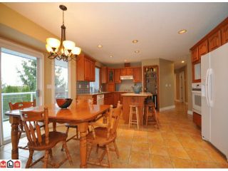 Photo 3: 5938 190A Street in Surrey: Cloverdale BC House for sale in "Rosewood Park" (Cloverdale)  : MLS®# F1007031