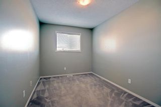 Photo 17: 384 Panatella Boulevard NW in Calgary: Panorama Hills Row/Townhouse for sale : MLS®# A2011748