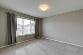 Photo 8: 217 Sunset Point: Cochrane Row/Townhouse for sale : MLS®# A2120759