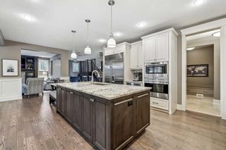 Photo 11: 22 Crestridge Mews SW in Calgary: Crestmont Detached for sale : MLS®# A2128973