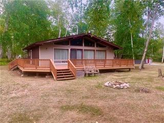 Photo 1: 18 Arapaho Bay in Buffalo Point: R17 Residential for sale : MLS®# 202126591