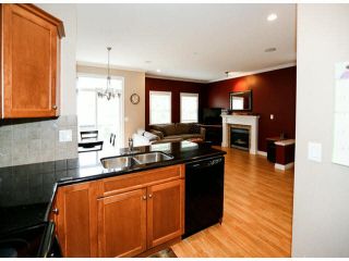 Photo 11: 4 6919 180TH Street in Surrey: Cloverdale BC Townhouse for sale in "PROVIDENCE" (Cloverdale)  : MLS®# F1423777