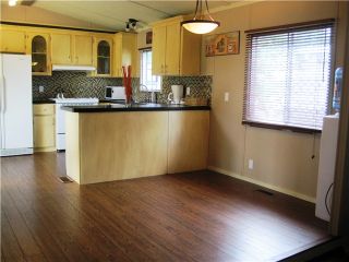 Photo 6: 71 145 KING EDWARD Street in Coquitlam: Maillardville Manufactured Home for sale in "MILL CREEK VILLAGE" : MLS®# V952658