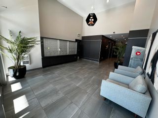 Photo 2: A313 20727 WILLOUGHBY TOWN CENTRE Drive in Langley: Willoughby Heights Condo for sale in "Residences" : MLS®# R2898230