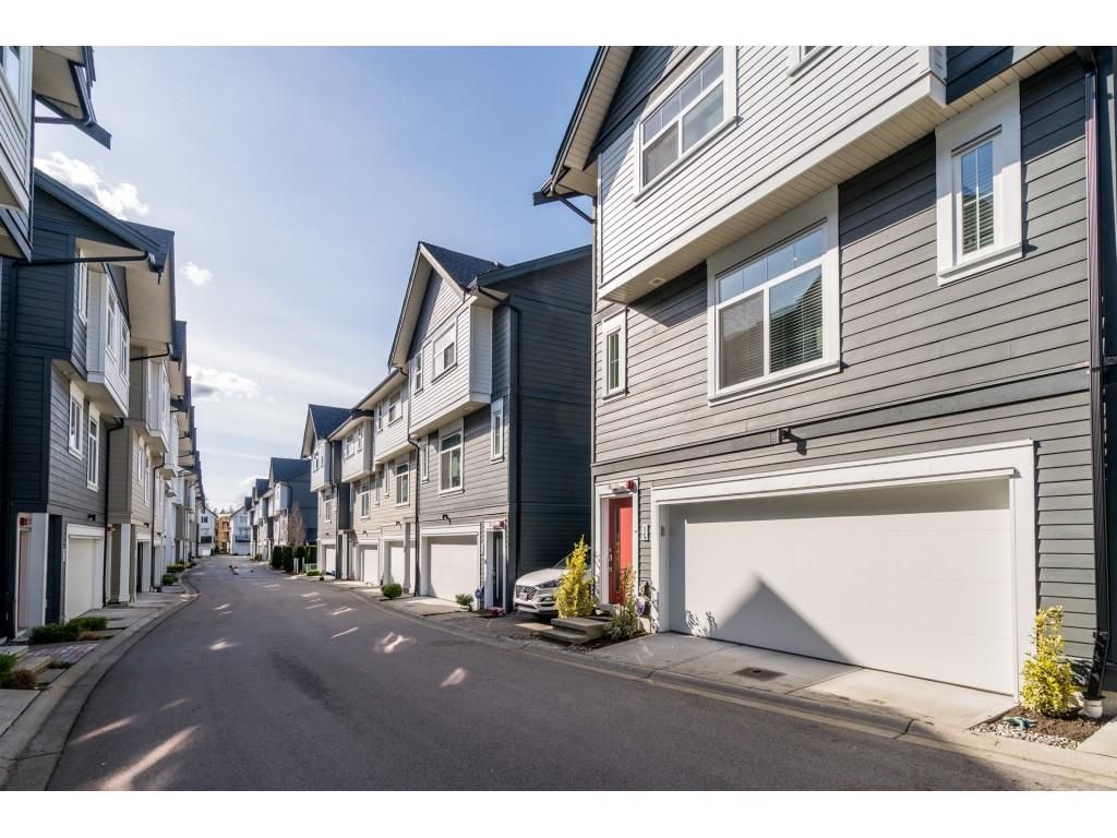 Main Photo: 15 7665 209 Street in Langley: Willoughby Heights Townhouse for sale in "ARCHSTONE-YORKSON" : MLS®# R2561969