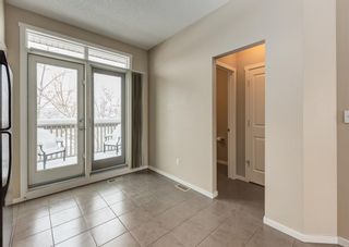 Photo 12: 1406 125 Panatella Way NW in Calgary: Panorama Hills Row/Townhouse for sale : MLS®# A2021769