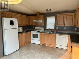 Photo 2: 66, 404 6 Avenue NW in Slave Lake: House for sale : MLS®# A2086005