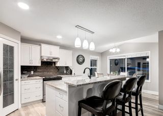 Photo 8: 2753 Coopers Manor SW: Airdrie Detached for sale : MLS®# A2034730