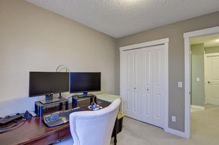 Photo 26: 179 Fireside Parkway: Cochrane Row/Townhouse for sale : MLS®# A1259498