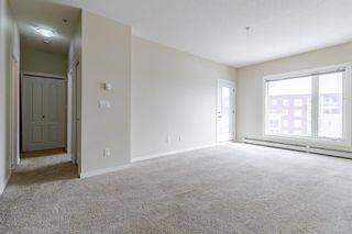 Photo 11: 1311 604 East Lake Boulevard NE: Airdrie Apartment for sale : MLS®# A1197256