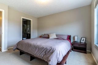 Photo 19: 448 Ascot Circle SW in Calgary: Aspen Woods Row/Townhouse for sale : MLS®# A1214167