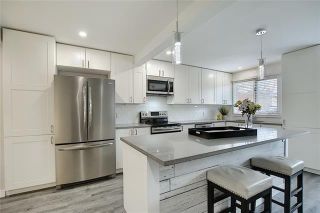 Photo 2: 18 23 GLAMIS Drive SW in Calgary: Glamorgan Row/Townhouse for sale : MLS®# C4293162