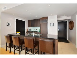 Photo 2: # 704 1455 HOWE ST in Vancouver: Yaletown Condo for sale in "POMARIA" (Vancouver West)  : MLS®# V1010474