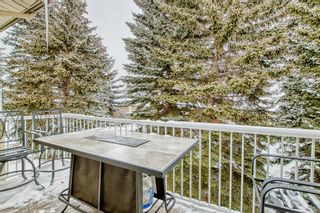 Photo 15: 106 Strathlorne Mews SW in Calgary: Strathcona Park Row/Townhouse for sale : MLS®# A2028228