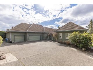 Photo 1: 34980 SKYLINE DRIVE in Abbotsford: House for sale : MLS®# R2767196
