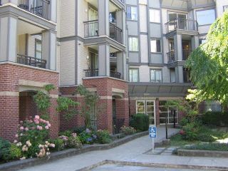 Photo 1: 202 10455 UNIVERSITY Drive in Surrey: Whalley Condo for sale in "D'COR" (North Surrey)  : MLS®# R2314923