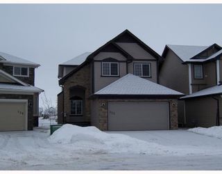 Photo 2: 125 CHANNELSIDE Cove SW: Airdrie Residential Detached Single Family for sale : MLS®# C3407858