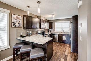 Photo 2: 1801 2461 Baysprings Link SW: Airdrie Row/Townhouse for sale : MLS®# A1228454