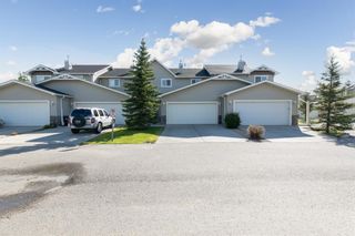 Photo 2: 58 Arbours Circle NW: Langdon Row/Townhouse for sale : MLS®# A1137898
