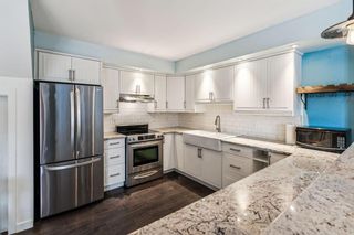 Photo 1: B 606 3 Avenue NW in Calgary: Sunnyside Apartment for sale : MLS®# A2110266