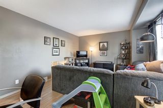 Photo 13: 2 123 Queensland Drive SE in Calgary: Queensland Row/Townhouse for sale : MLS®# A2010360