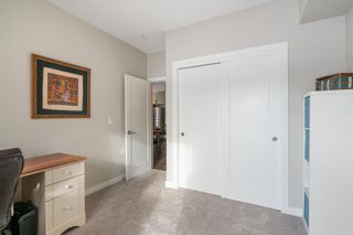 Photo 14: 104 300 Auburn Meadows Manor SE in Calgary: Auburn Bay Apartment for sale : MLS®# A2022411