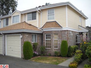 Photo 1: 144 12233 92 Avenue in Surrey: Queen Mary Park Surrey Townhouse for sale in "Orchard Lake" : MLS®# F1021469
