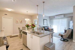 Photo 5: 105 100 Auburn Meadows Manor SE in Calgary: Auburn Bay Apartment for sale : MLS®# A1212332
